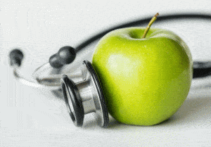 Pomme verte avec stéthoscope